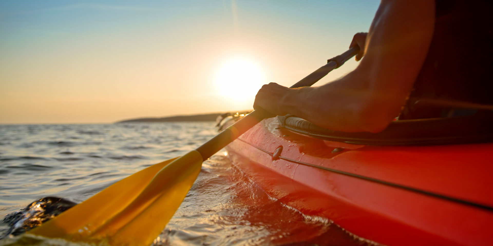 kayaking at sunset