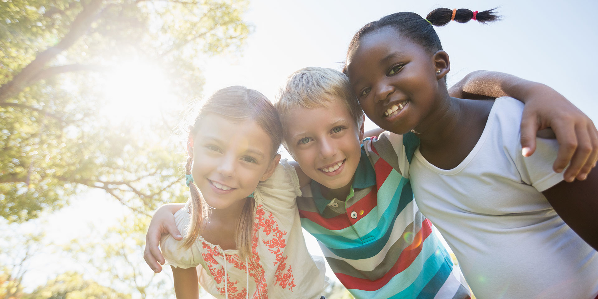 three children smiling